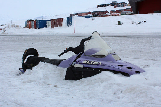 abandoned snowmobile